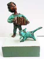 Bronzen beeld Accordeonist van Twan de Vos, accordeonspeler, muziek en kat, poes