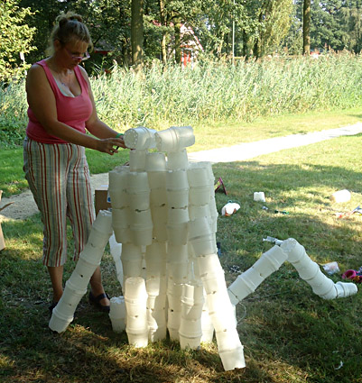 Sculpture made ??from biobased flower pots made ??of potato of a frog for the exhibition Landart Diessen by Twan de Vos