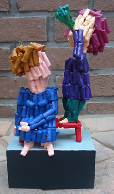 Sculpture Musical seduction by Twan de Vos, man tries to seduce woman