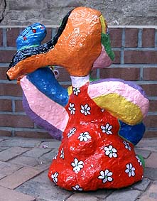 Sculpture "Guitar Singer" polyester statue of a woman playing guitar or at least plays a stringed instrument