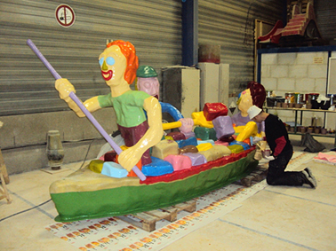 painting the polyester sculpture of the peat ship which will be placed in Stadskanaal